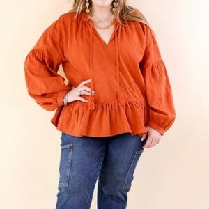 Textured Long sleeve peplum top